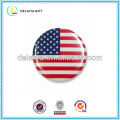 The USA flag tin badge